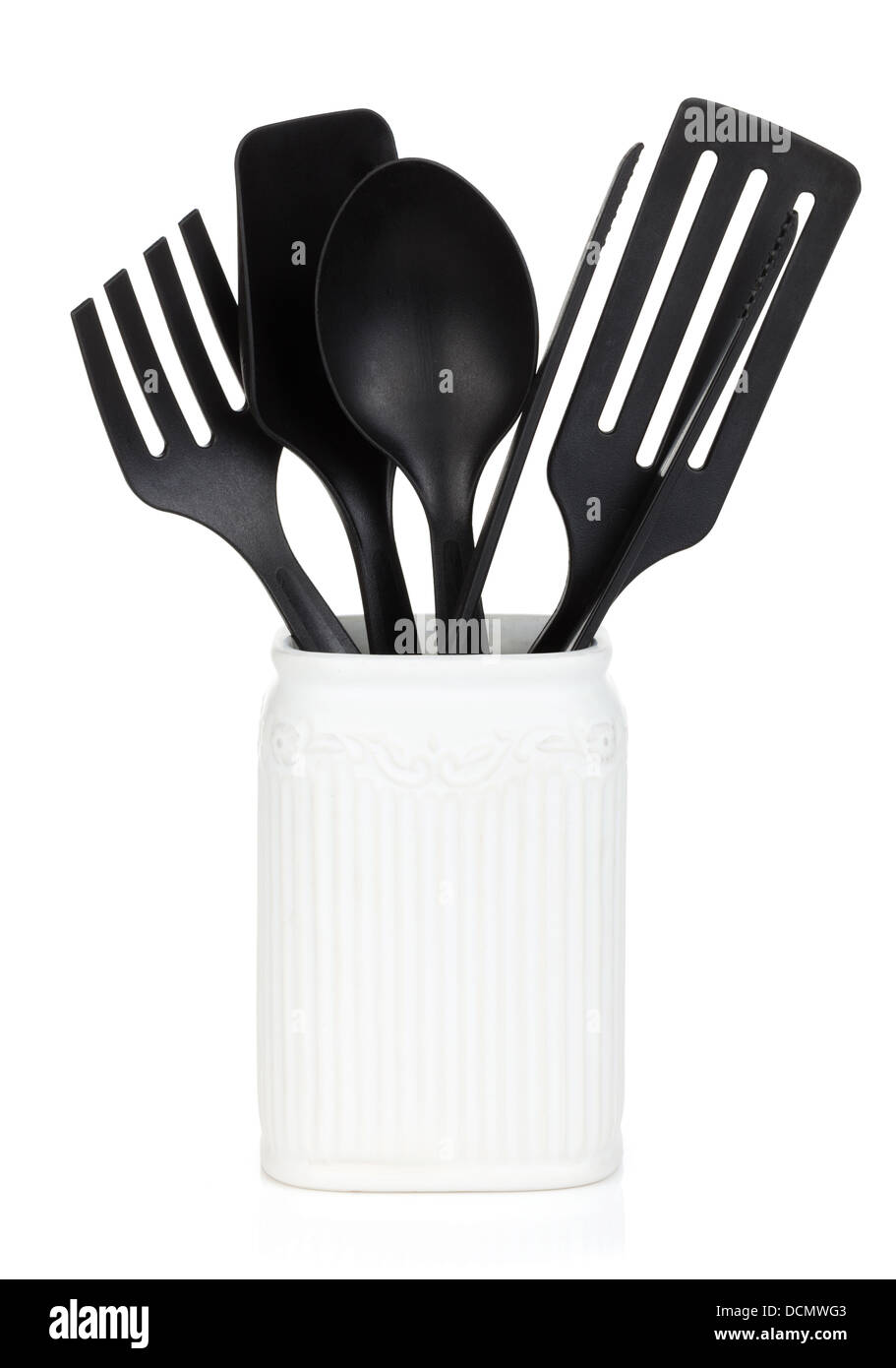 Kitchen utensils in holder. Isolated on white background Stock Photo