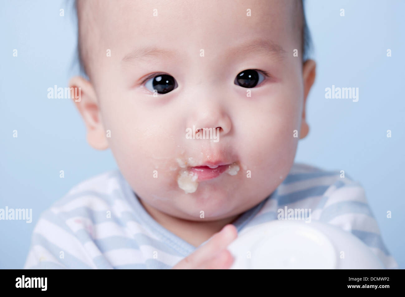 a baby having food Stock Photo