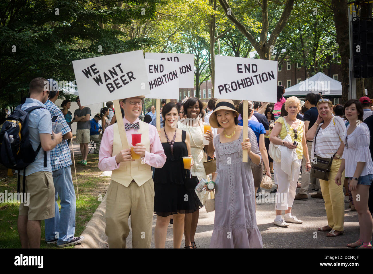 Faux protesters dress up in costume for the 8th Bi-Annual Jazz Age Lawn Party on Governor's Island in New York Stock Photo