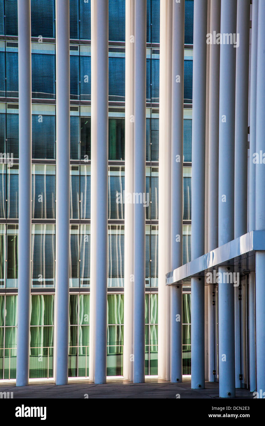 Part of the modern Philharmonie concert hall in Luxembourg city with a modern office block behind. Stock Photo