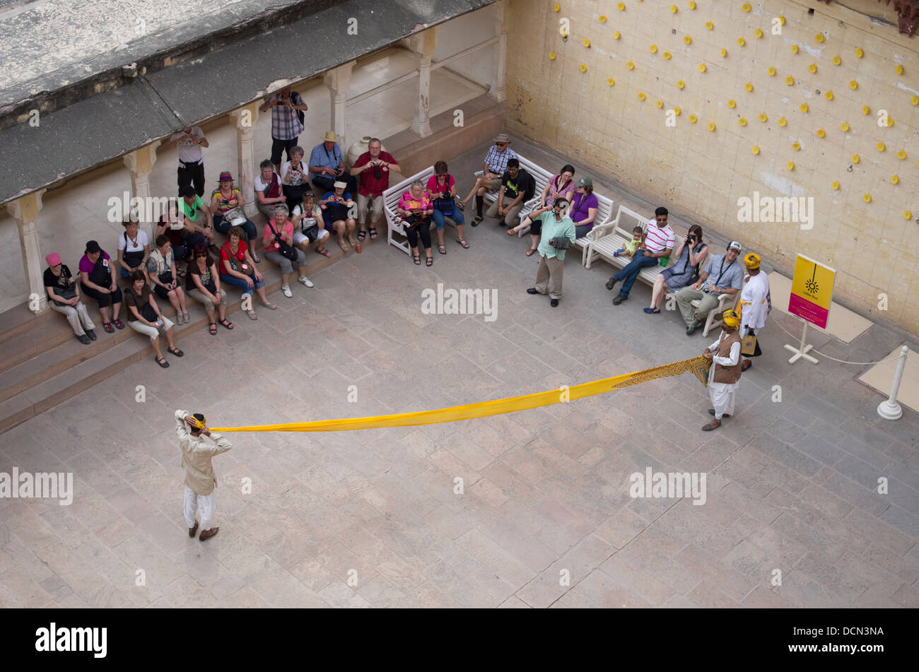 Turban tying demonstration at Meherangarh Fort - Jodhpur, Rajashtan, India Stock Photo