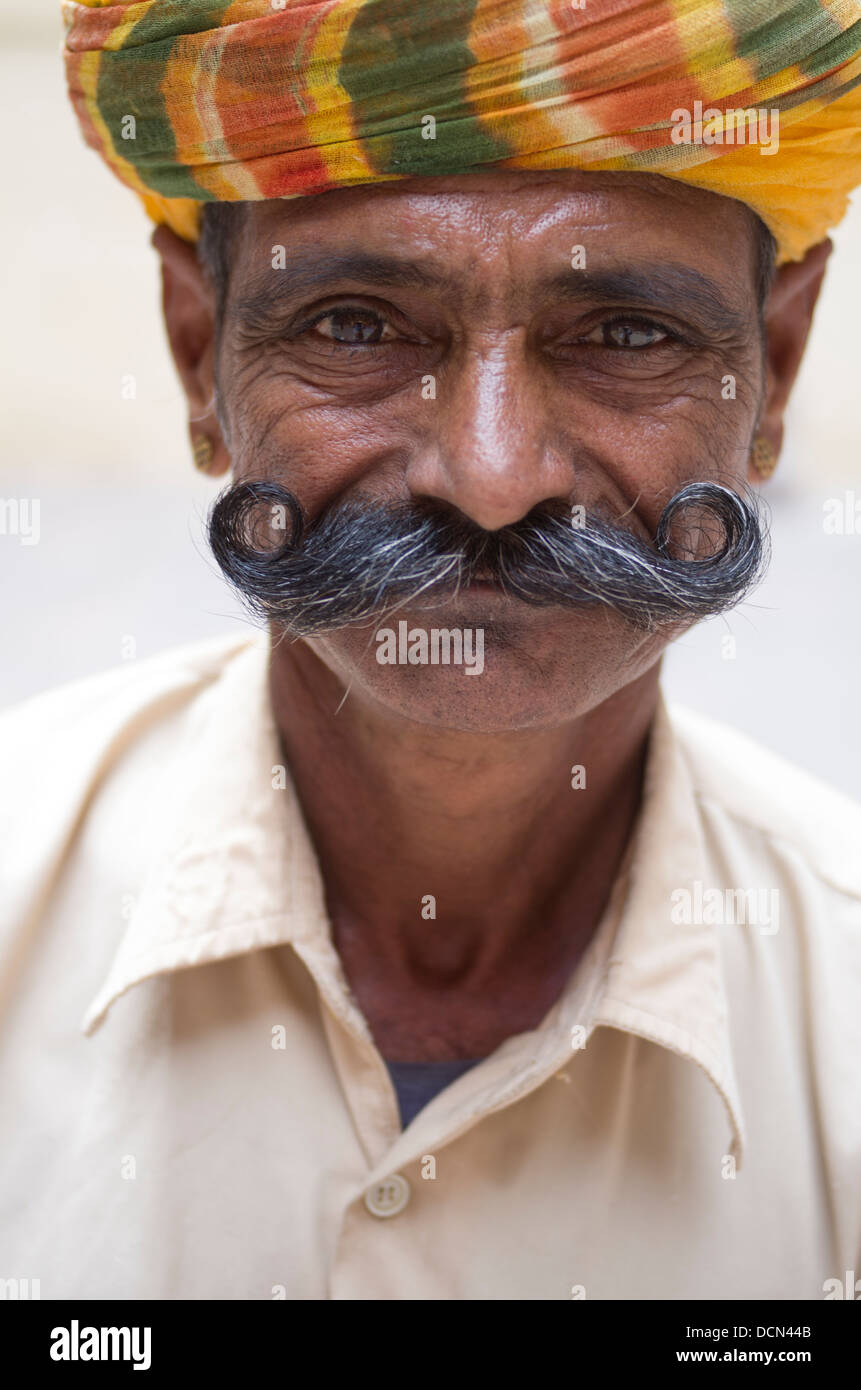 Indian man with fantastic mustache and turban at Meherangarh Fort - Jodhpur, Rajasthan India Stock Photo