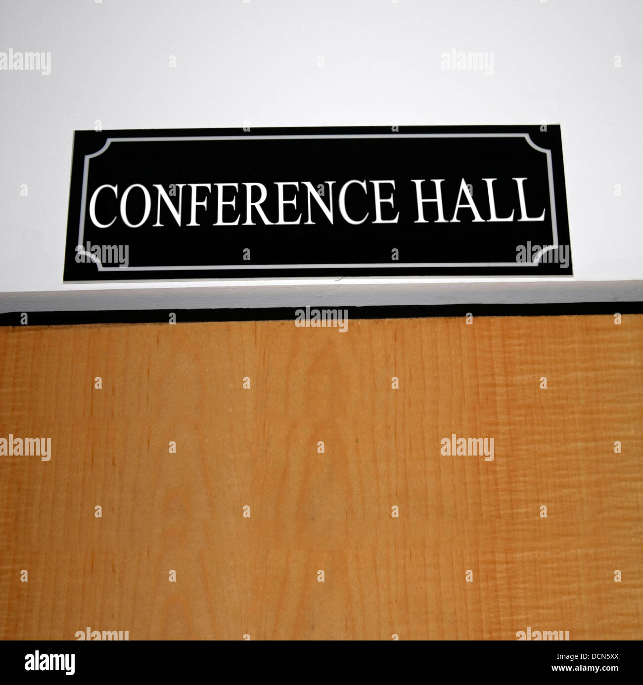 A board displayed in front of a discussion room Stock Photo