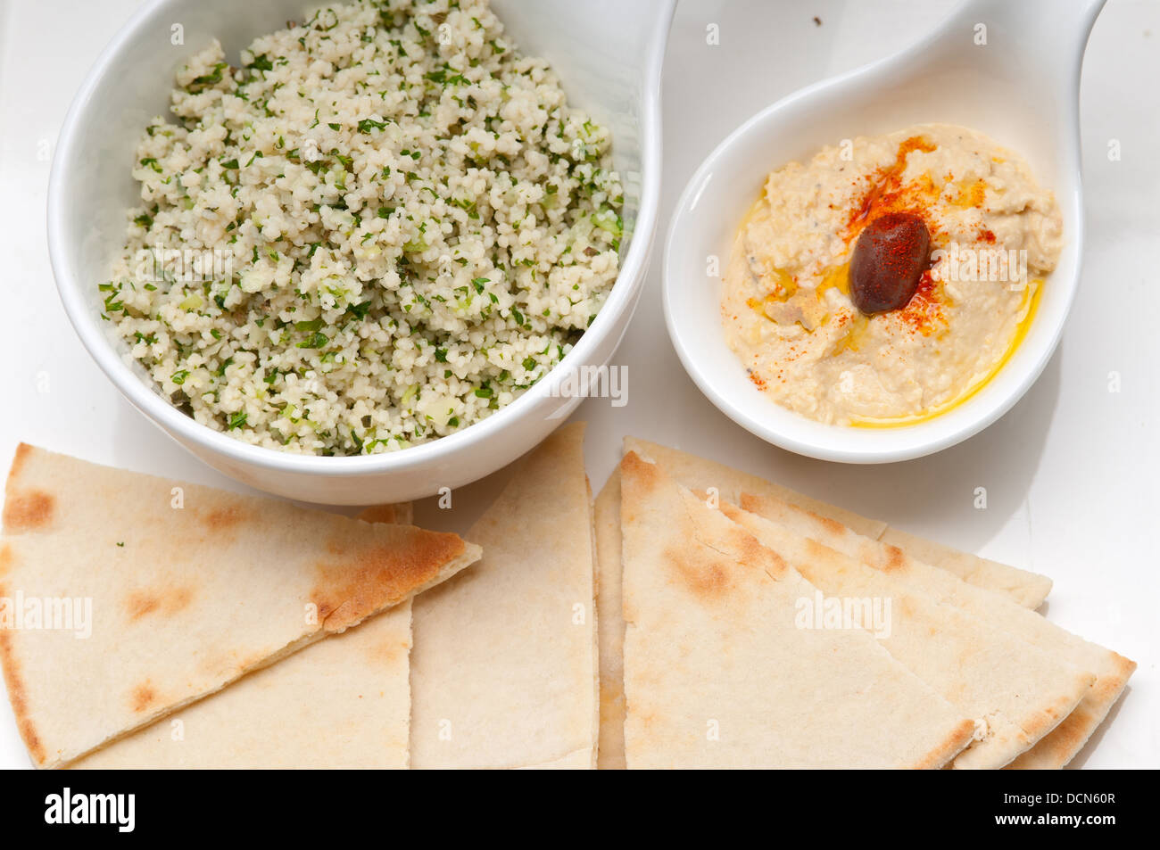 taboulii couscous with hummus Stock Photo Alamy