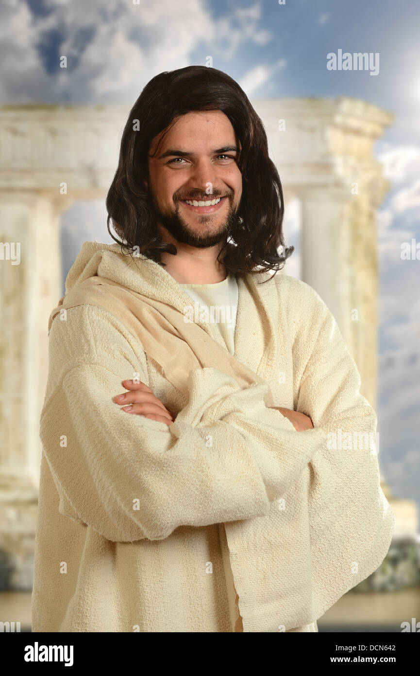 Portrait of Jesus smiling with arms crossed with temple in ...