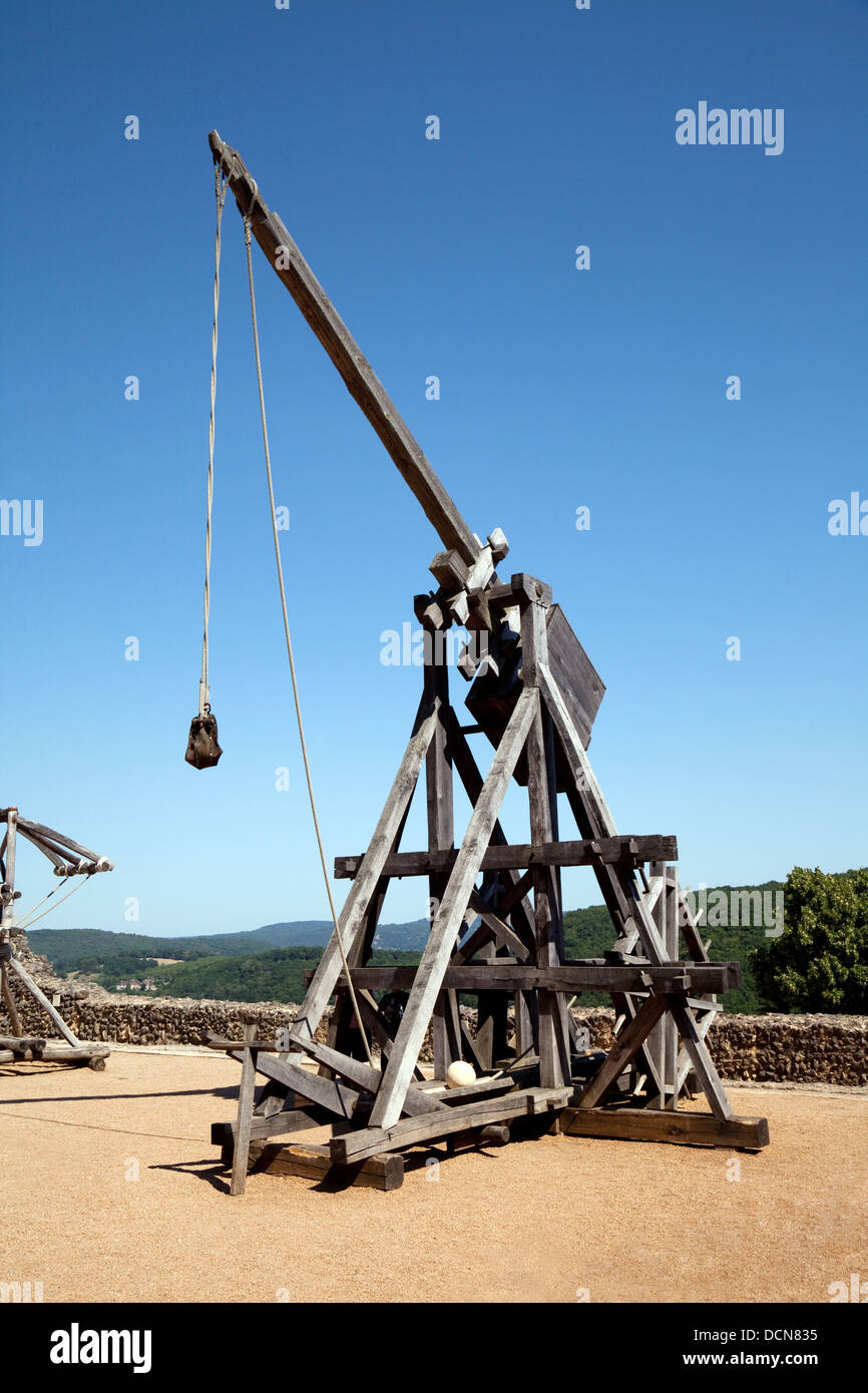 A trebuchet, a medieval catapult or seige weapon, at  Castelnaud la Chapelle chateau castle, the Dordogne, France europe Stock Photo