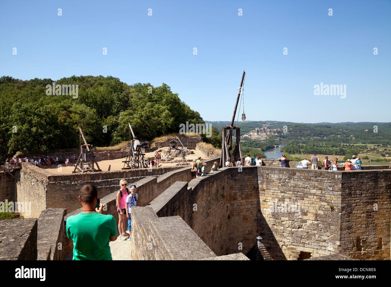 Tourists at the Museum of medieval Warfare looking at medieval weapons, Chateau ( castle ) of Castelnaud-la-Chapelle, the Dordogne, France, Europe Stock Photo