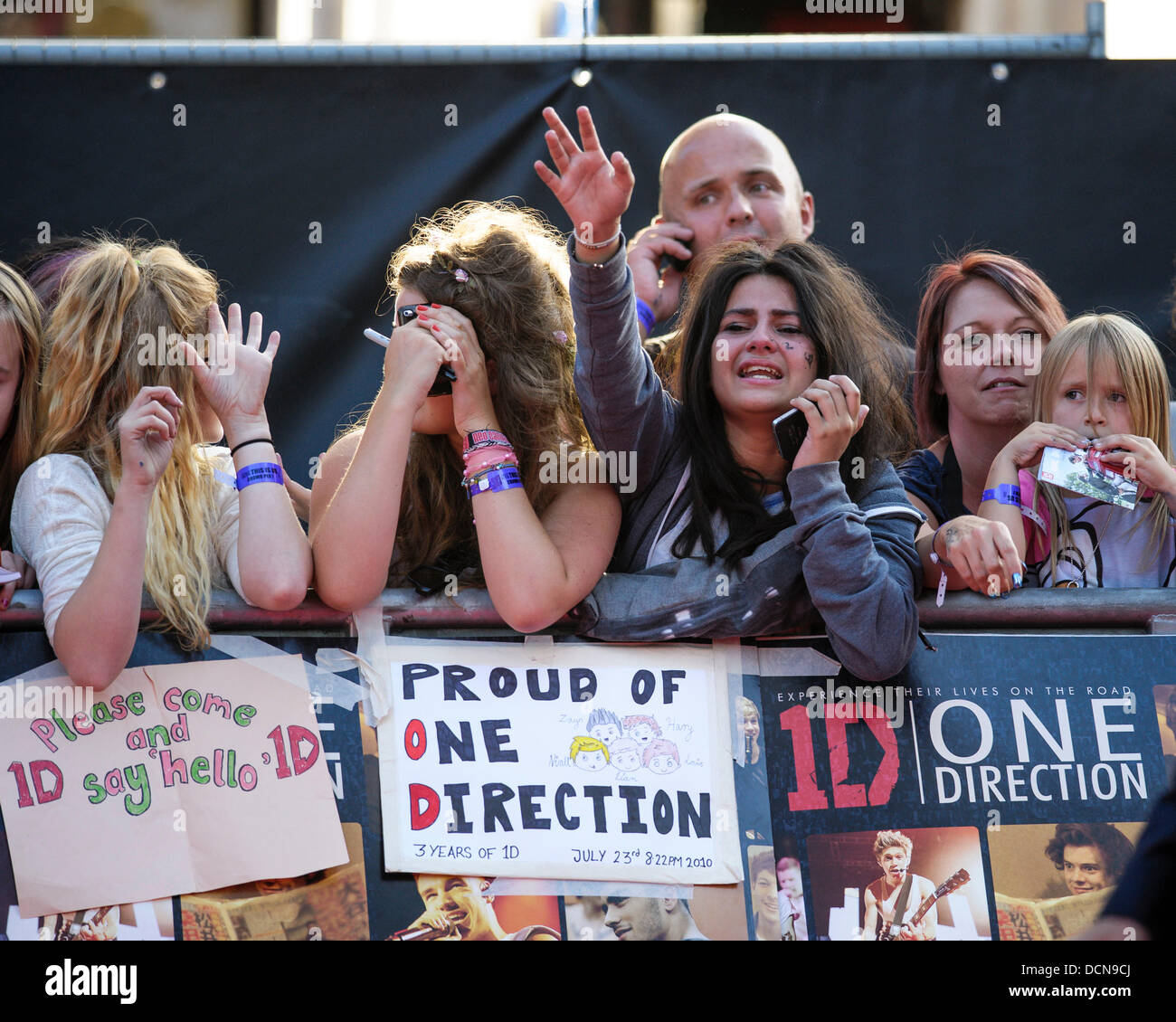 London, UK, 20/08/2013 : The World Premiere of One Direction - This is us  3D. Pictured: . Fans crying. Picture by Julie Edwards Stock Photo - Alamy