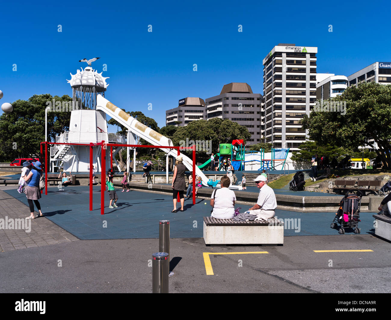 dh Lambton Harbour WELLINGTON NEW ZEALAND Families and childern playing playground Frank Kitts Park children waterfront Stock Photo