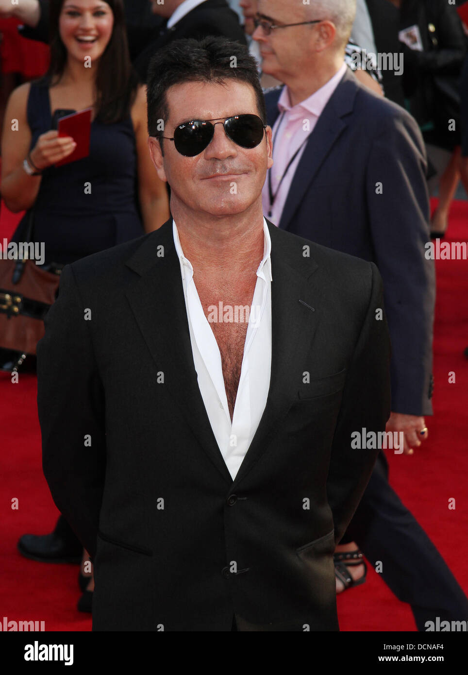 Simon cowell at the world premiere of one direction hi-res stock ...