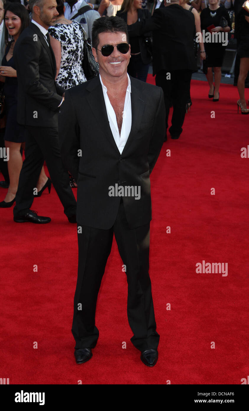 Simon cowell at the world premiere of one direction hi-res stock ...