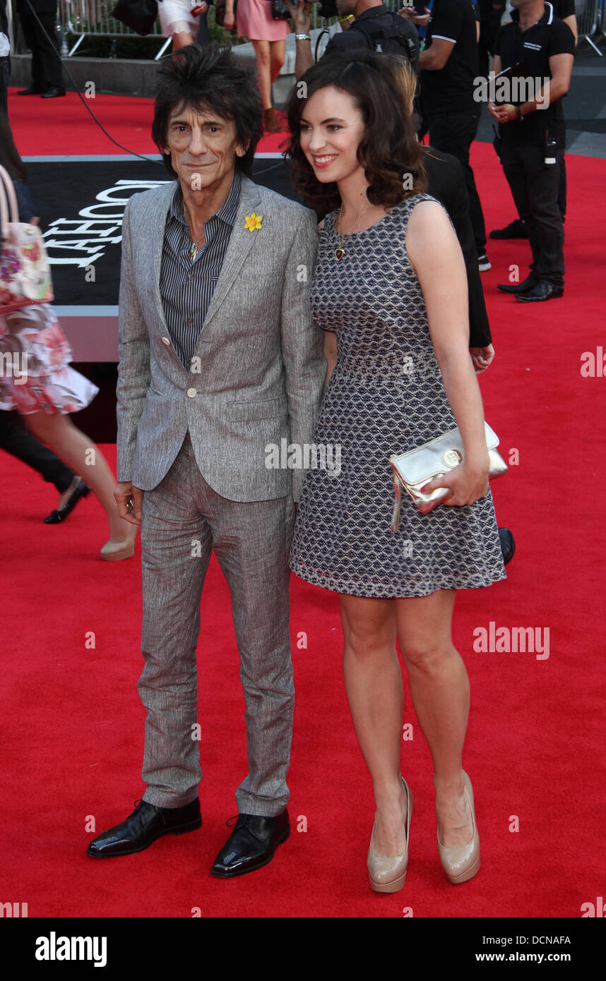 London, UK, 20th August 2013. Ronnie Wood and Sally Wood attend the World Premiere of 'One Direction: This Is Us' at Empire Leicester Square Credit:  WFPA/Alamy Live News Stock Photo