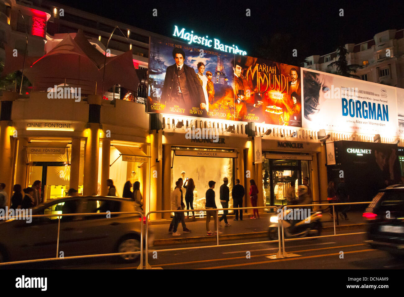 Advertising new films on the streets of an evening, Cannes, French Riviera, France. Stock Photo