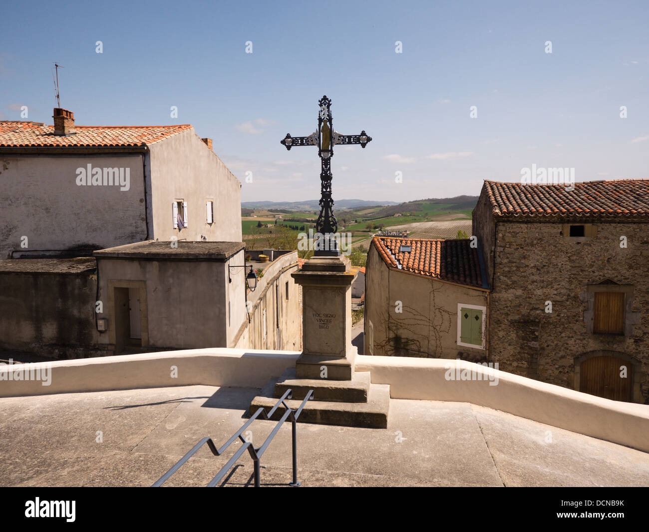 Crucifix presdies over the hilltop village of Bellegardedu=Razes Aude