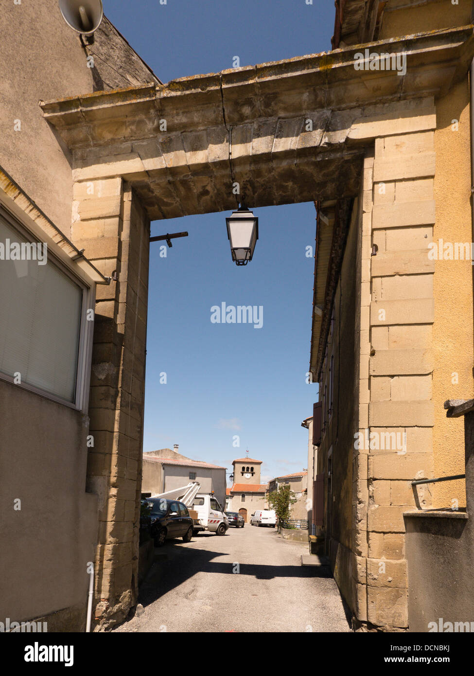 Stone archway leading into thehilltop village of BellegardeduRazes