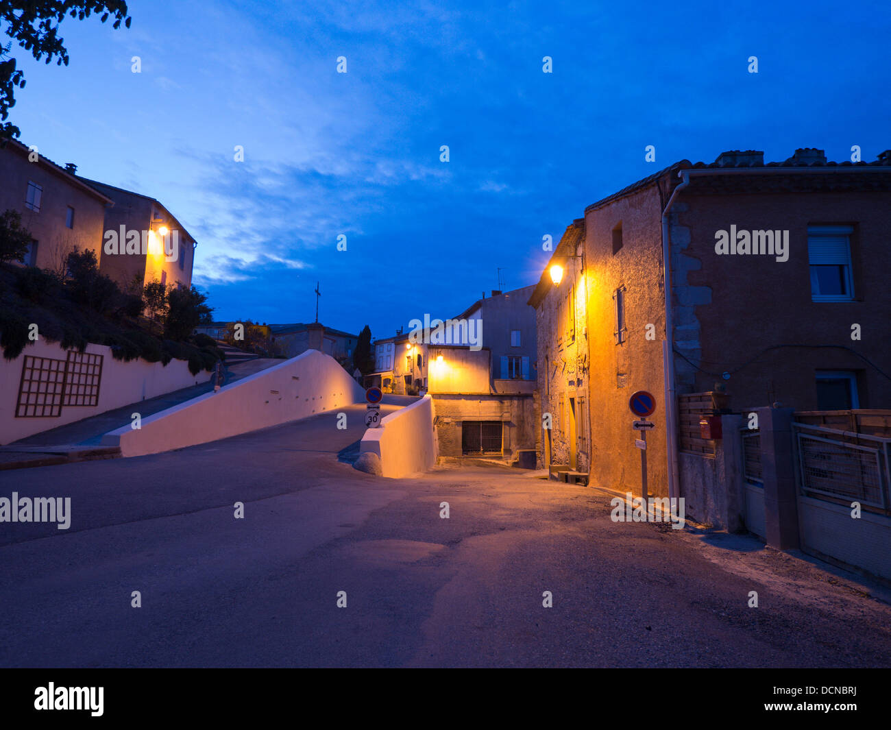 Night time scene in the hilltop village of BellegardeduRazes, Aude, Laguedoc, France Stock