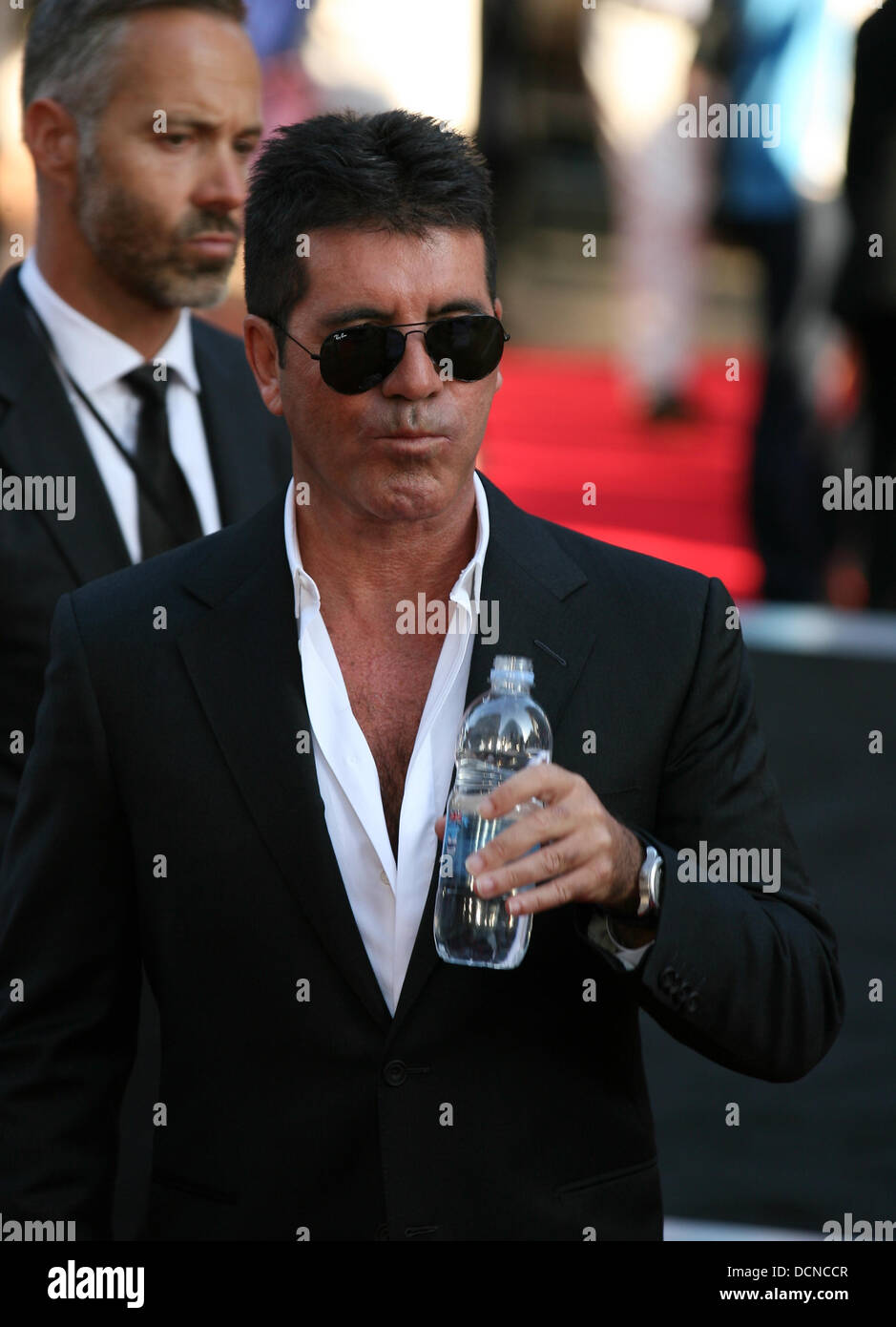 Simon cowell at the world premiere of one direction hi-res stock ...