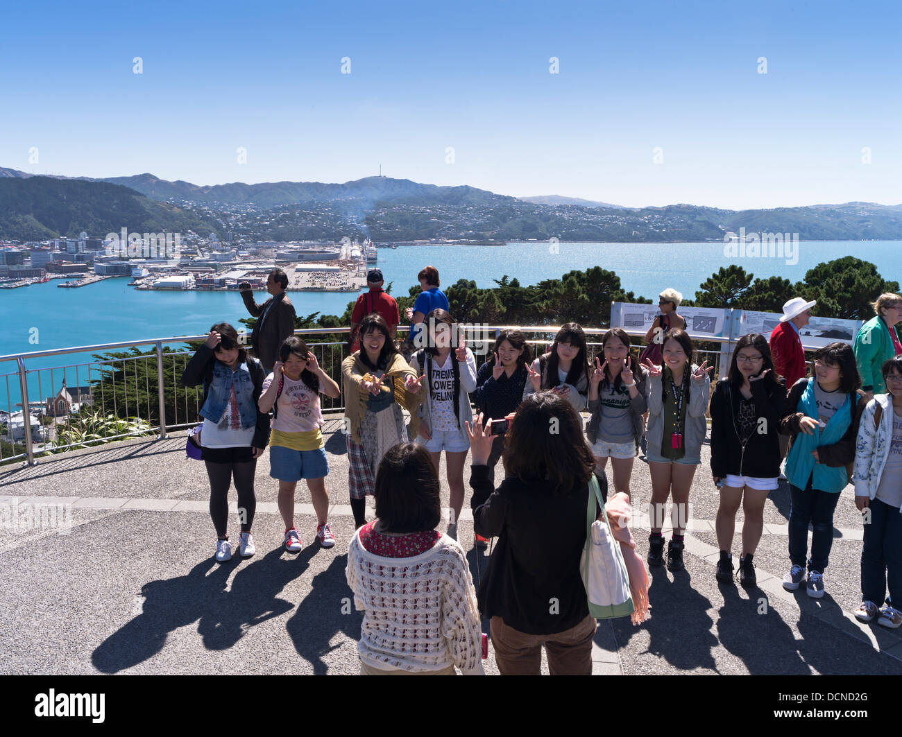 dh Mount Victoria WELLINGTON NEW ZEALAND Lookout Japanese teenager girl tourists picture taking view tourist snapshots Stock Photo