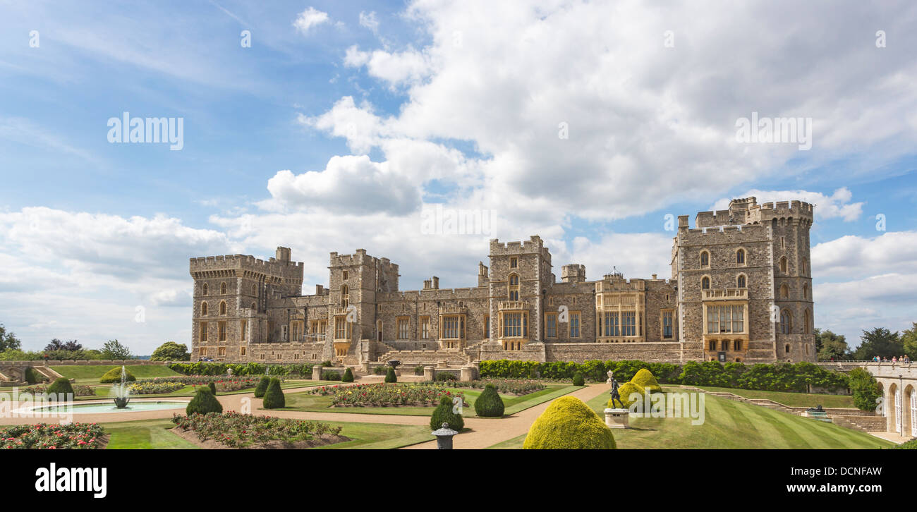 Sightseeing: summer view of iconic royal residence Windsor Castle, Prince of Wales's Tower and Brunswick Tower and gardens, England, blue sky Stock Photo