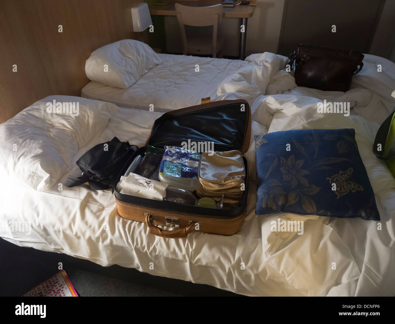 Travel items luggage on bed hi-res stock photography and images - Alamy