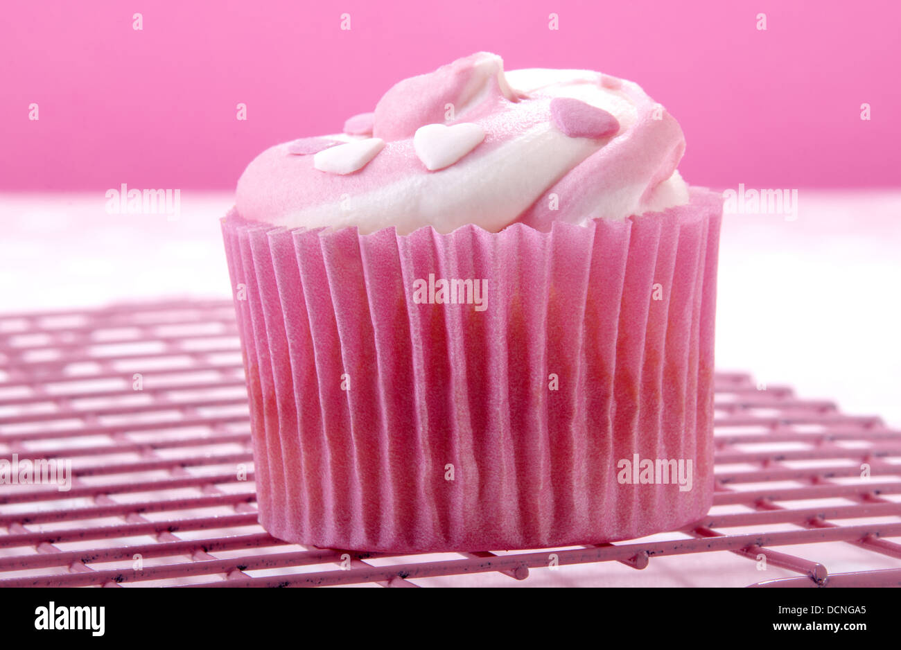 cupcake with white and pink butter cream Stock Photo - Alamy