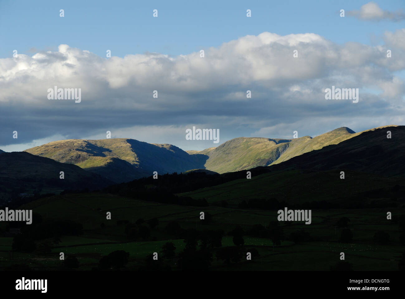 Mountains in distance, Lake District National Park, Cumbria, UK Stock Photo