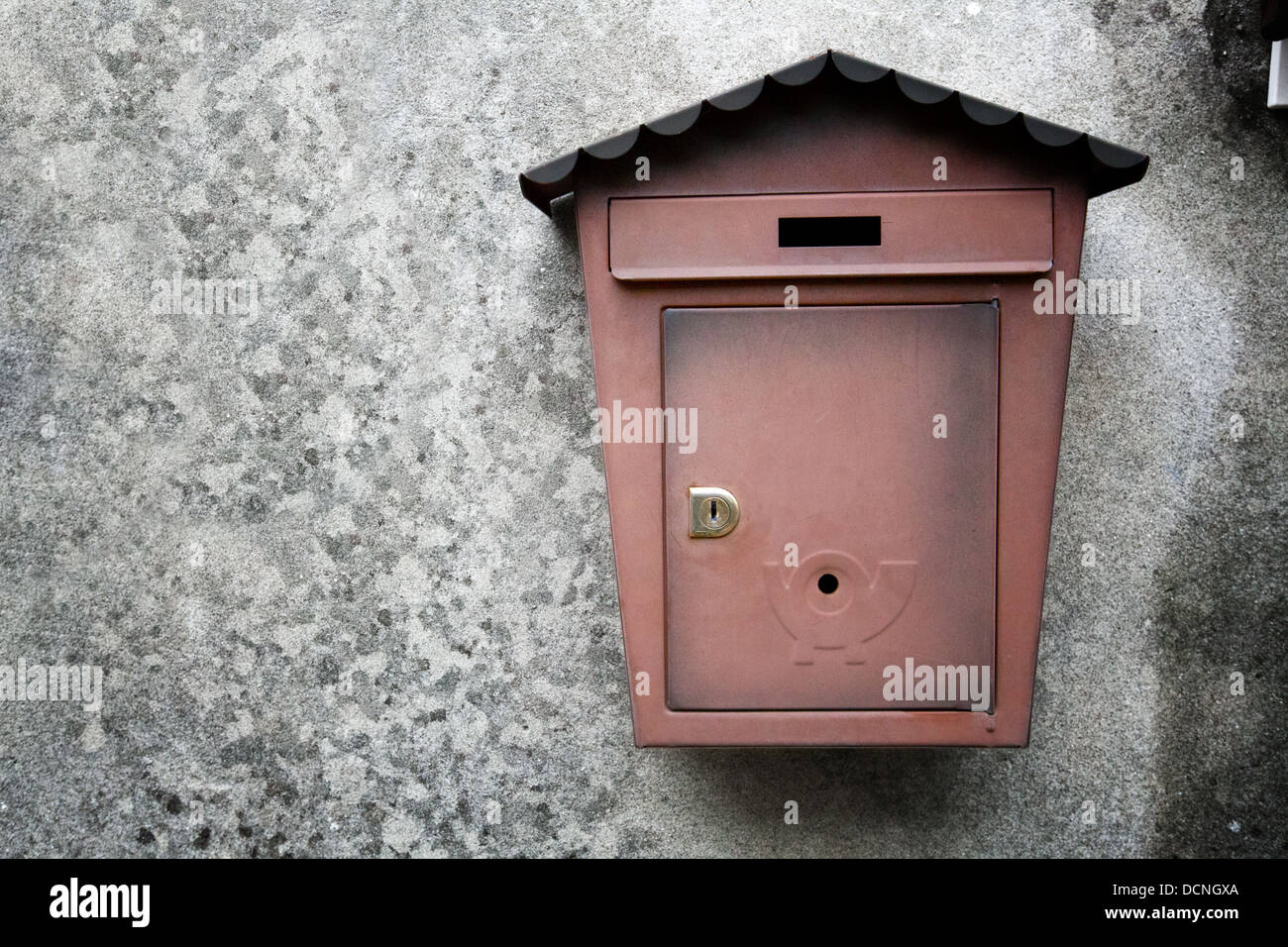 metallic mailboxes on old wall background Stock Photo - Alamy