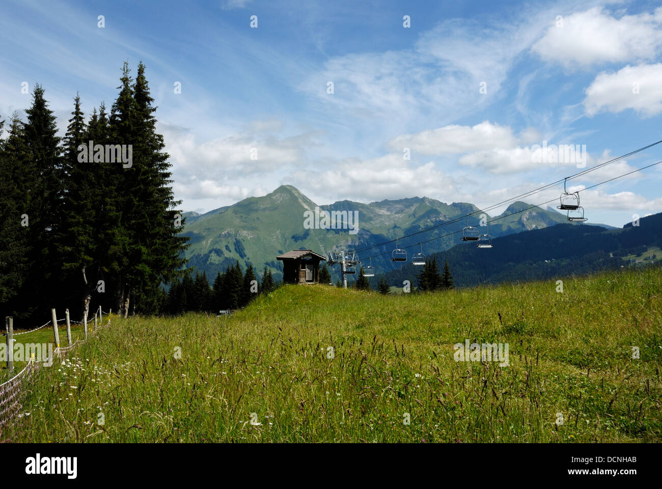 Ski lifts with mountains behind in the French alps, Summer time, France Stock Photo