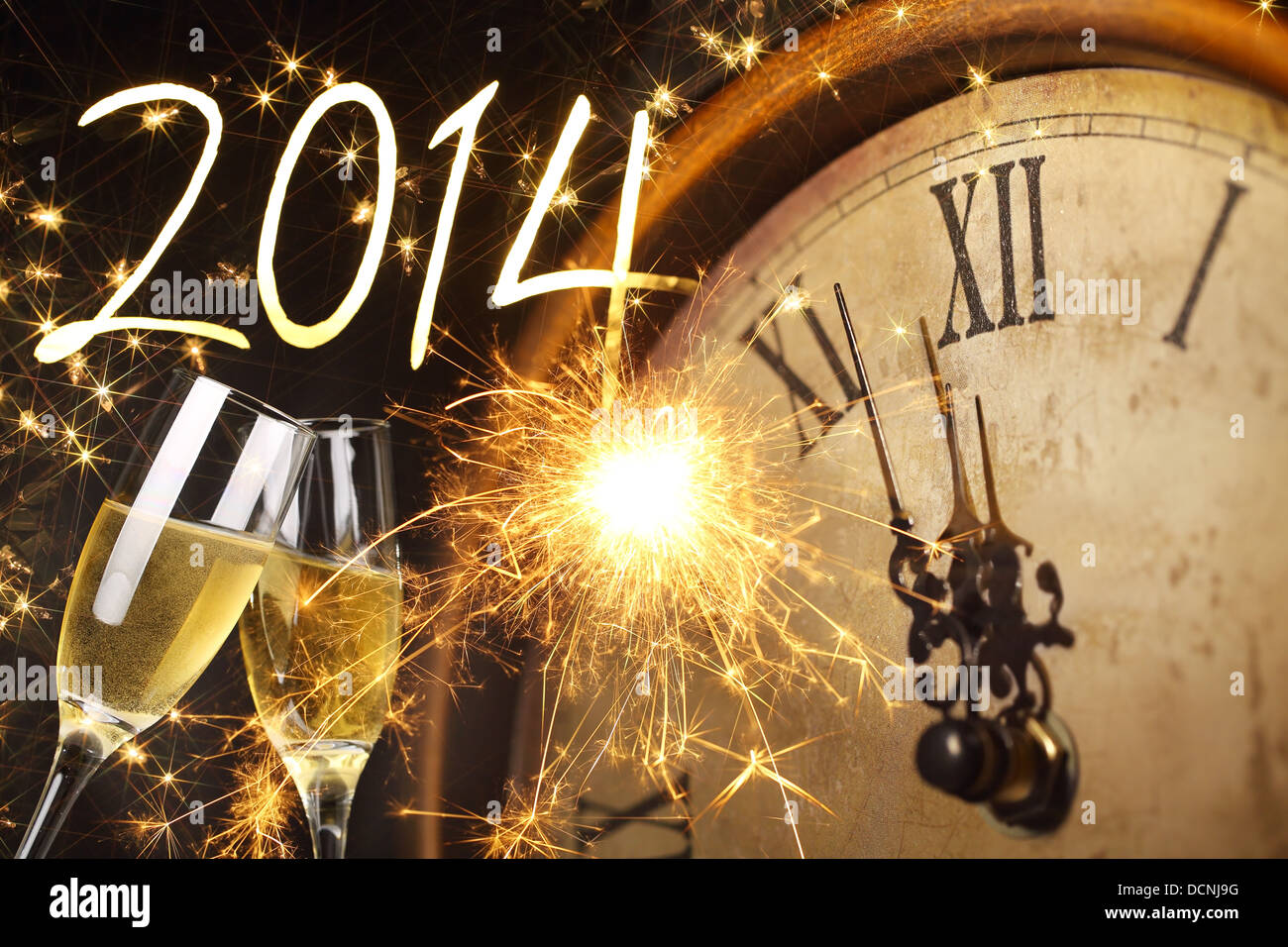Glasses with champagne against fireworks and clock close to midnight 2014 Stock Photo