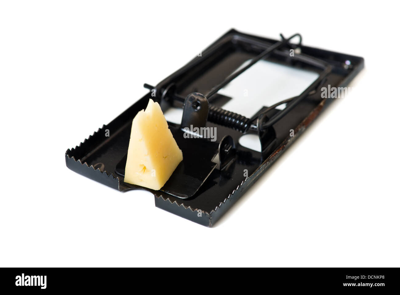 Metal mousetrap with cheese isolated over white Stock Photo