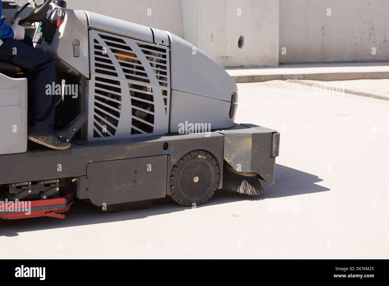machine cleaning dust from sidewalk Stock Photo - Alamy