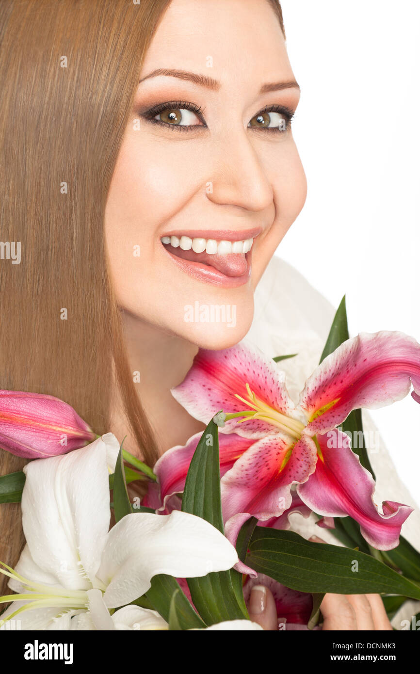 Woman xxl lilies smiling tongue Stock Photo
