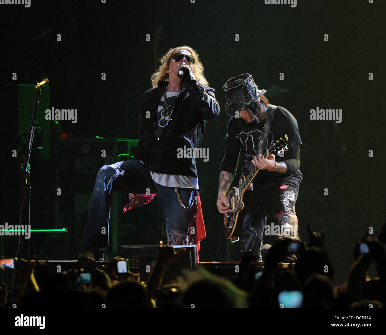 Axl Rose of Guns N' Roses performs at the American Airlines Arena ...