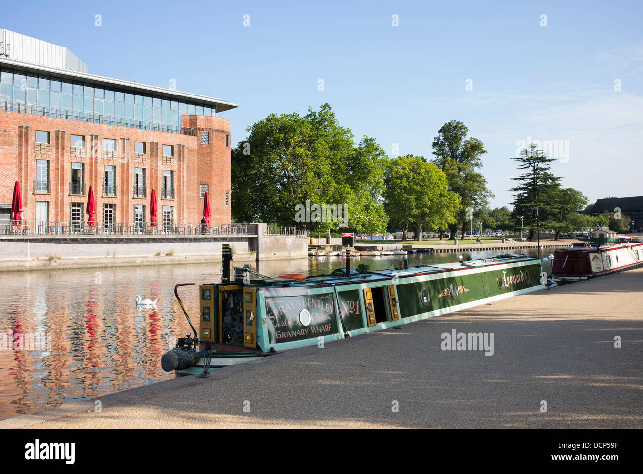 Canal boat on the river Avon opposite The RSC theatre, Waterside, Stratford upon Avon, Warwickshire, England Stock Photo