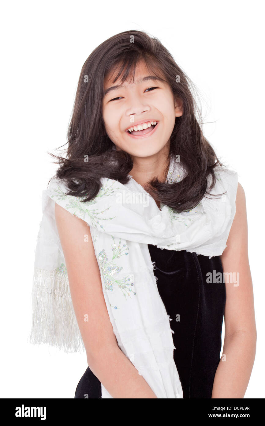 Beautiful young girl in formal gress standing, smiling Stock Photo