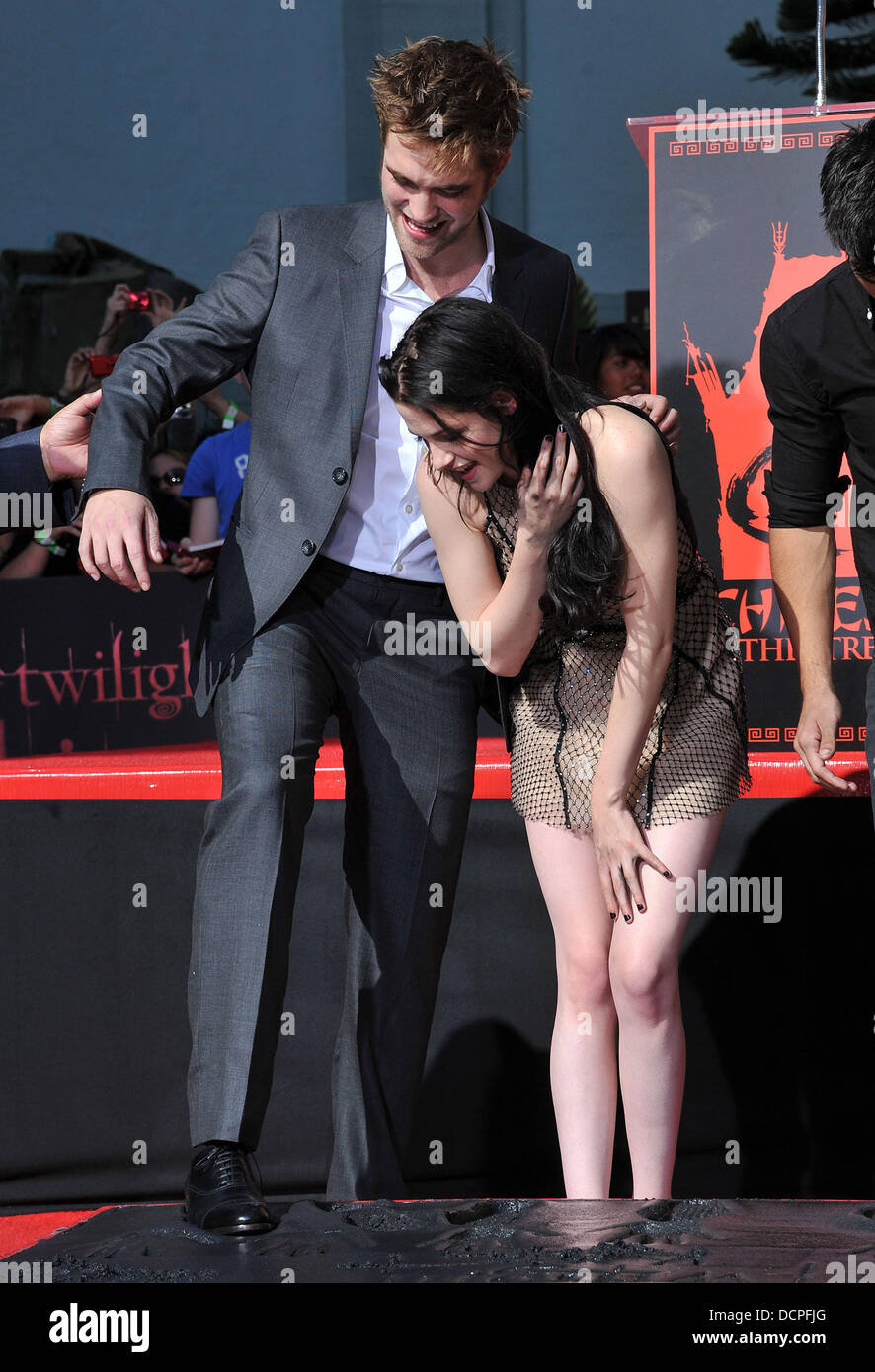 Robert Pattinson + Kristen Stewart  Stars of 'The Twilight Saga' films are honoured with a Hand and Footprint Ceremony outside Grauman's Chinese Theatre  Los Angeles, California - 03.11.11 Stock Photo