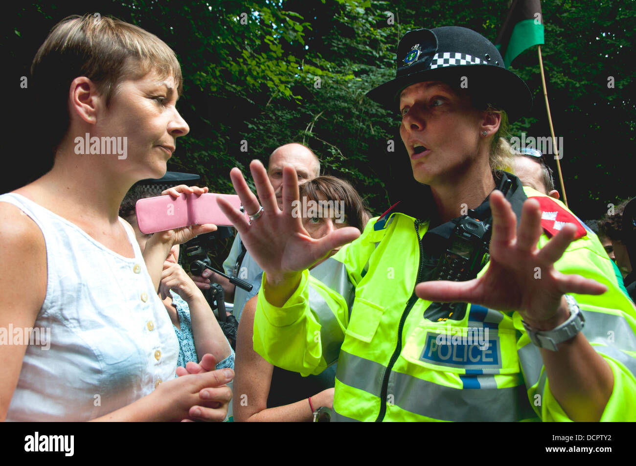 Site of Cuadrilla drilling. Demonstration against fracking . Caroline Lucas, Green MP talks to a policewoman Stock Photo