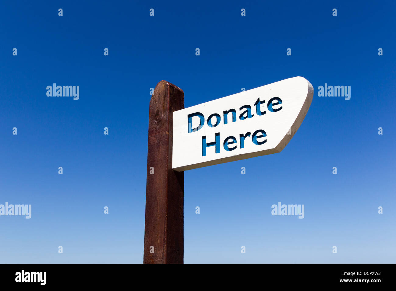 Donate Here Sign Stock Photo