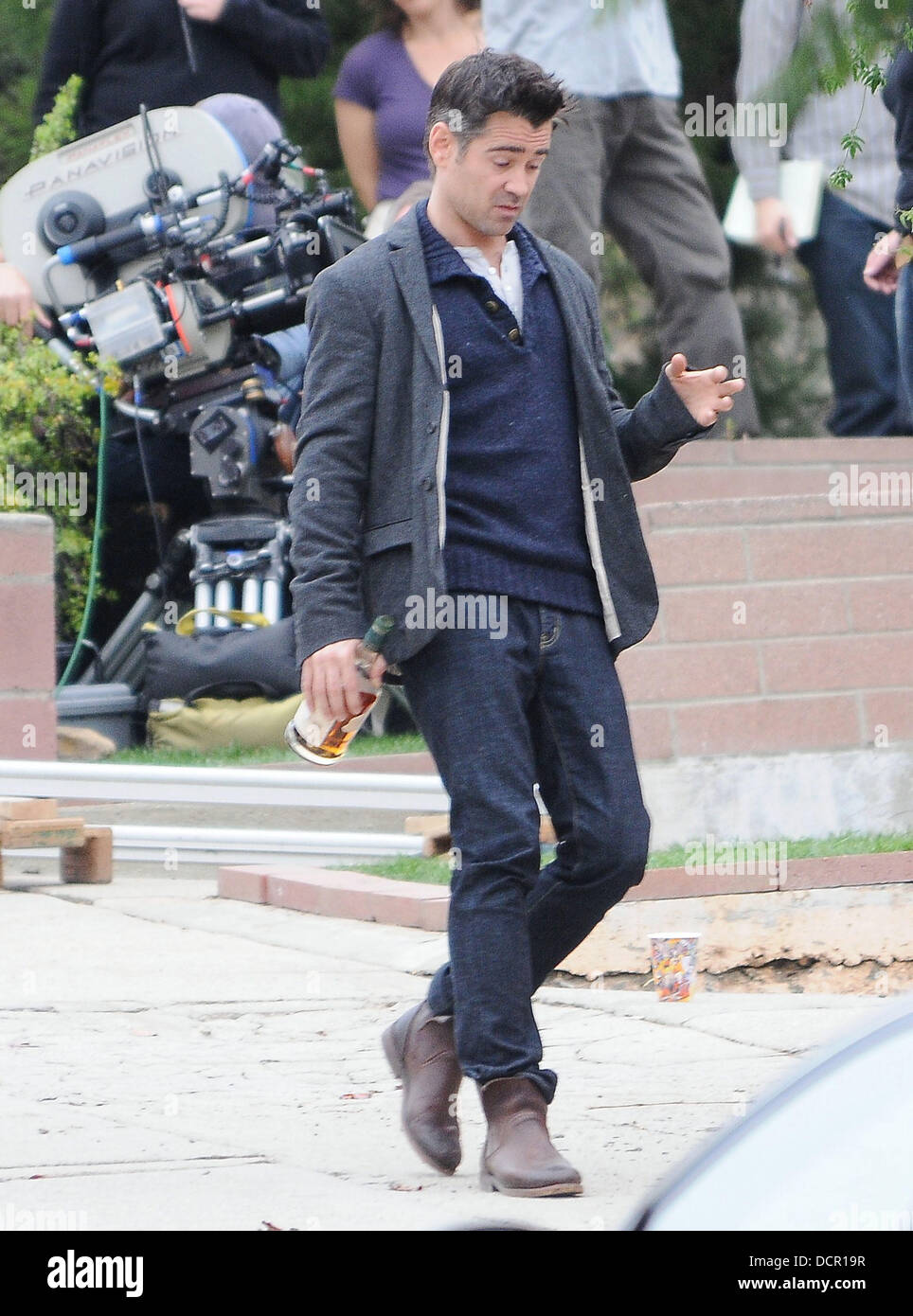 Irish actor, Colin Farrell looks inebriated as he drinks from a bottle of Buffalo Trace Kentucky Straight Bourbon Whiskey, as he films a scene of new movie 'Seven Psychopaths', a film about a man who gets involved in a friend's dog-napping plot. Los Angel Stock Photo