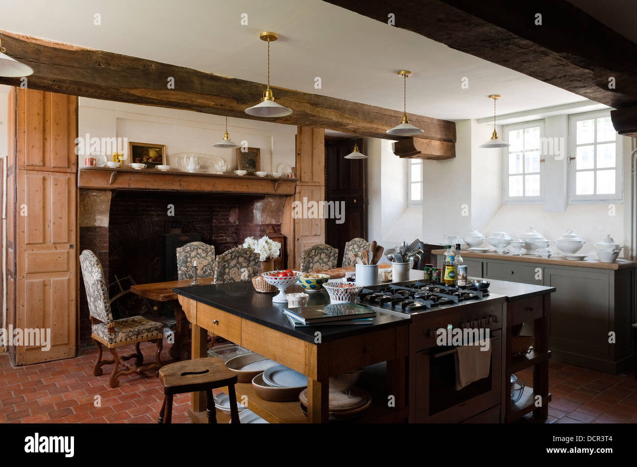 Island Hob Unit In Kitchen With Wooden Ceiling Beams And