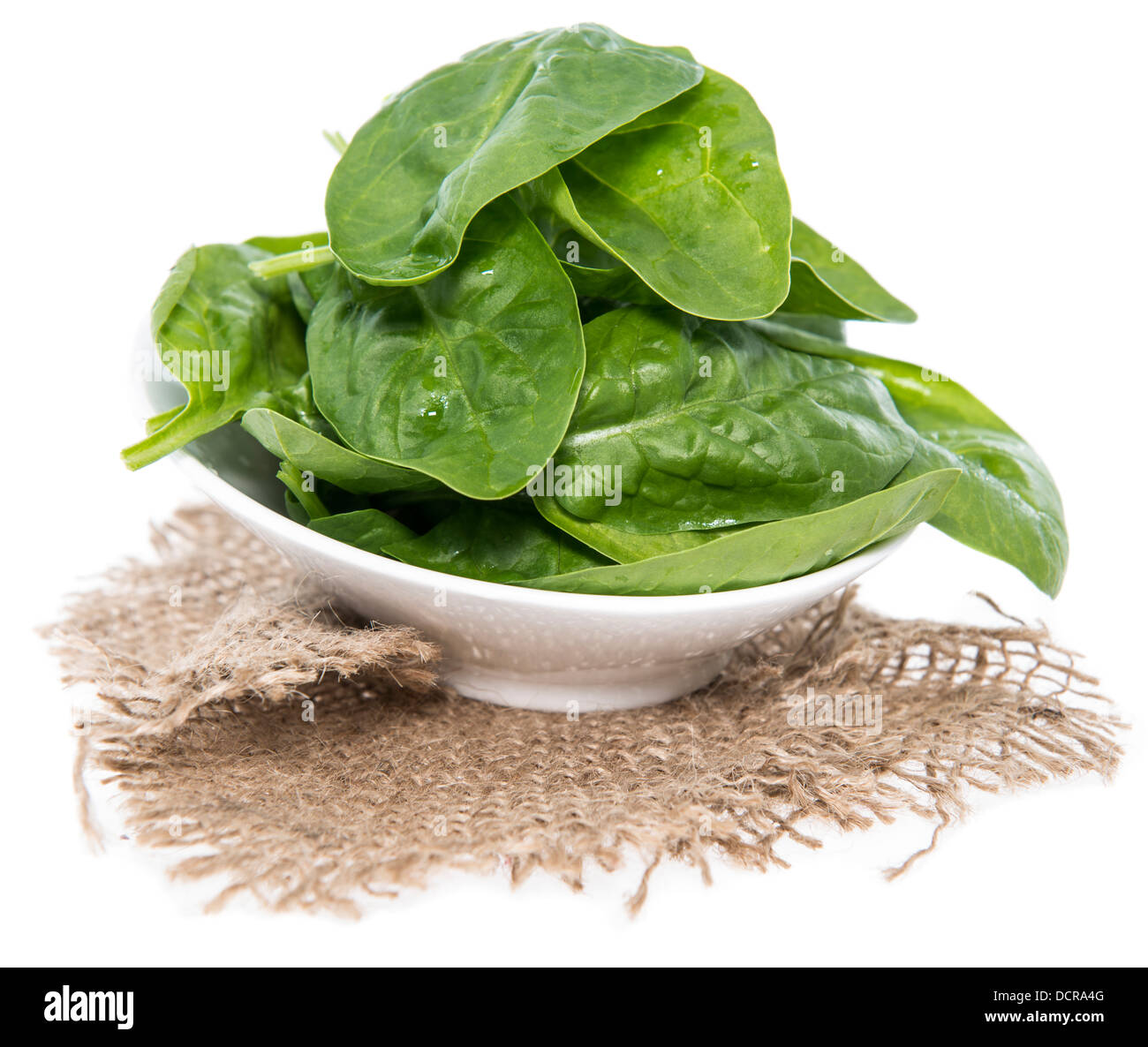 Portion of Spinach isolated on white background Stock Photo - Alamy