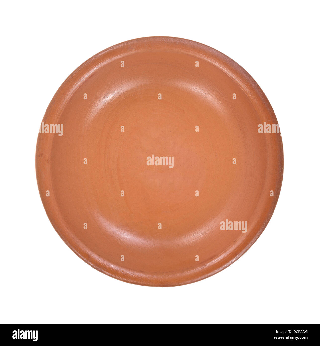Top view of an empty small red clay bowl on a white background Stock