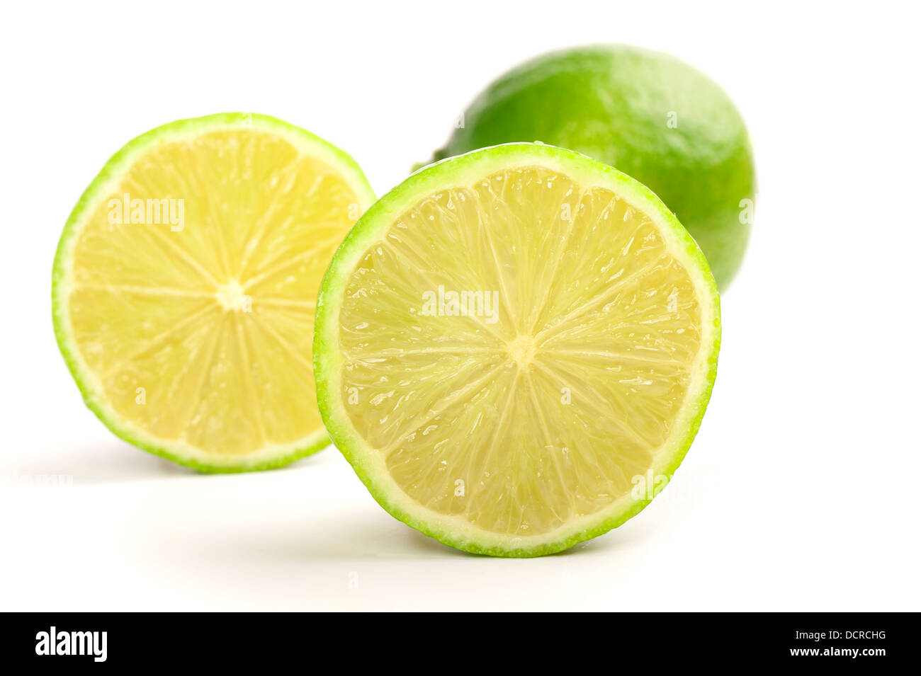 Slice of fresh lemon isolated on white background Stock Photo - Alamy
