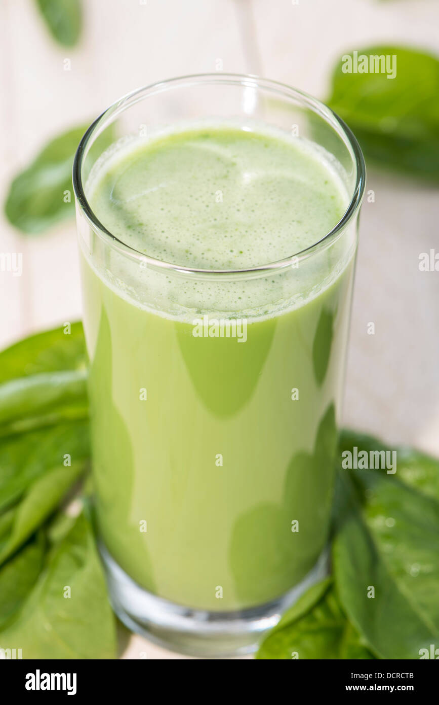 Spinach Juice on wooden background (macro shot Stock Photo Alamy