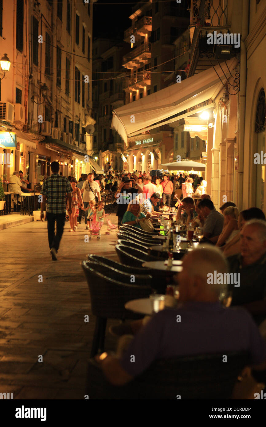 Busy street restaurants and cafes in the old part of Corfu Town Stock ...