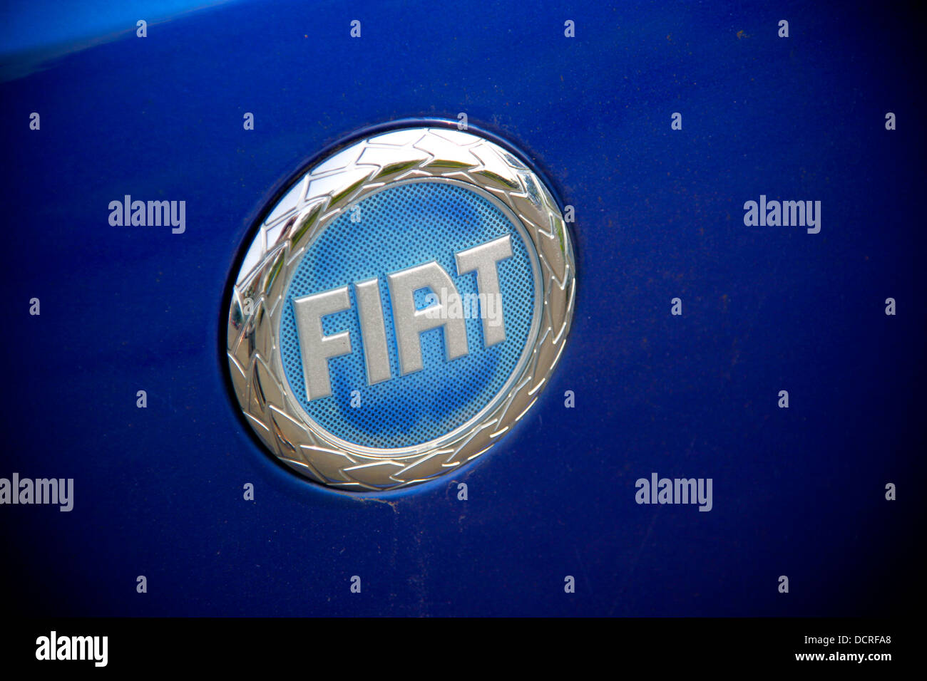 Fiat car badge on blue car Stock Photo