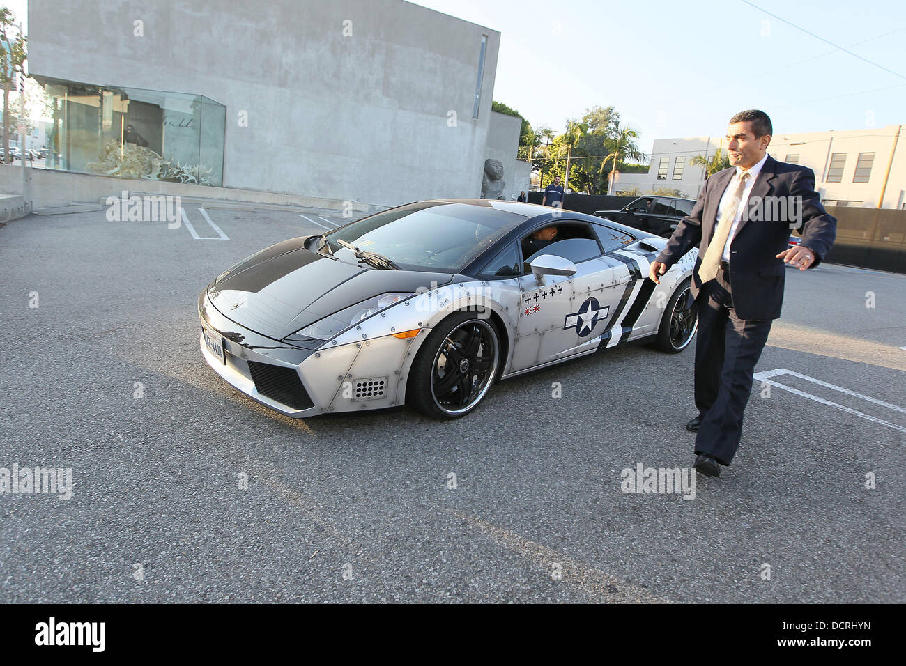 Chris Brown and Karrauche Tran seen leaving Maxfield clothing store in
