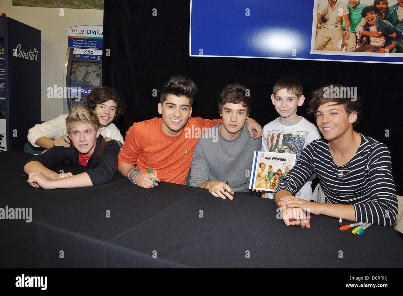 Harry Styles Niall Horan Zayn Malik Liam Payne And Louis Tomlinson One Direction Attend A Signing For Their New Album Up All Night At Tesco Extra Maynooth In Kildare Kildare Ireland
