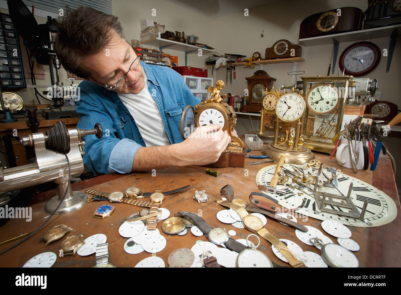 A Clock Maker And Repairman; St. Catharines, Ontario, Canada Stock Photo