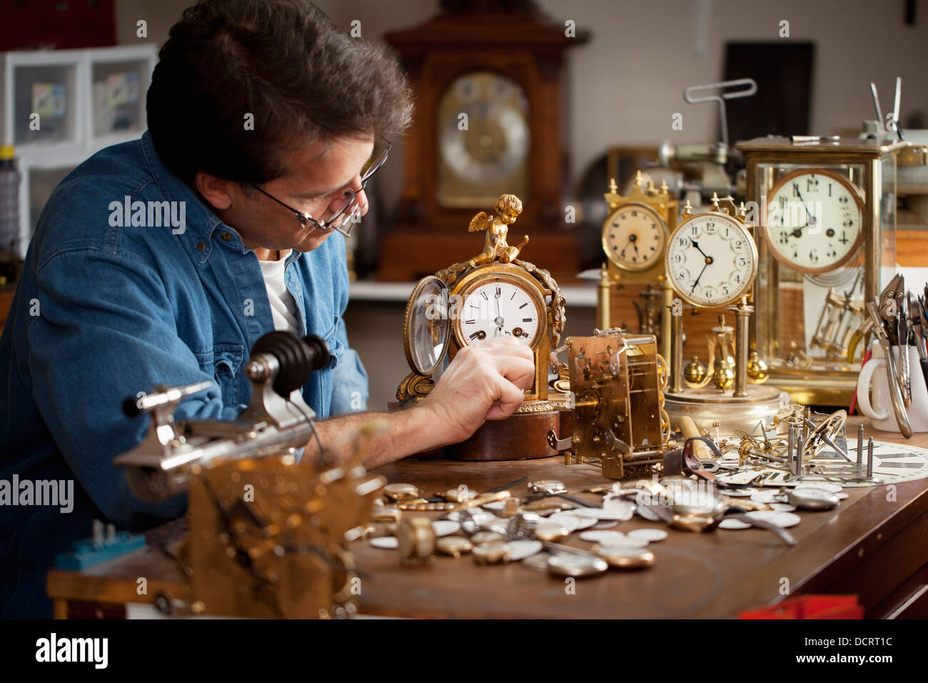 A Clock Maker And Repairman; St. Catharines, Ontario, Canada Stock Photo